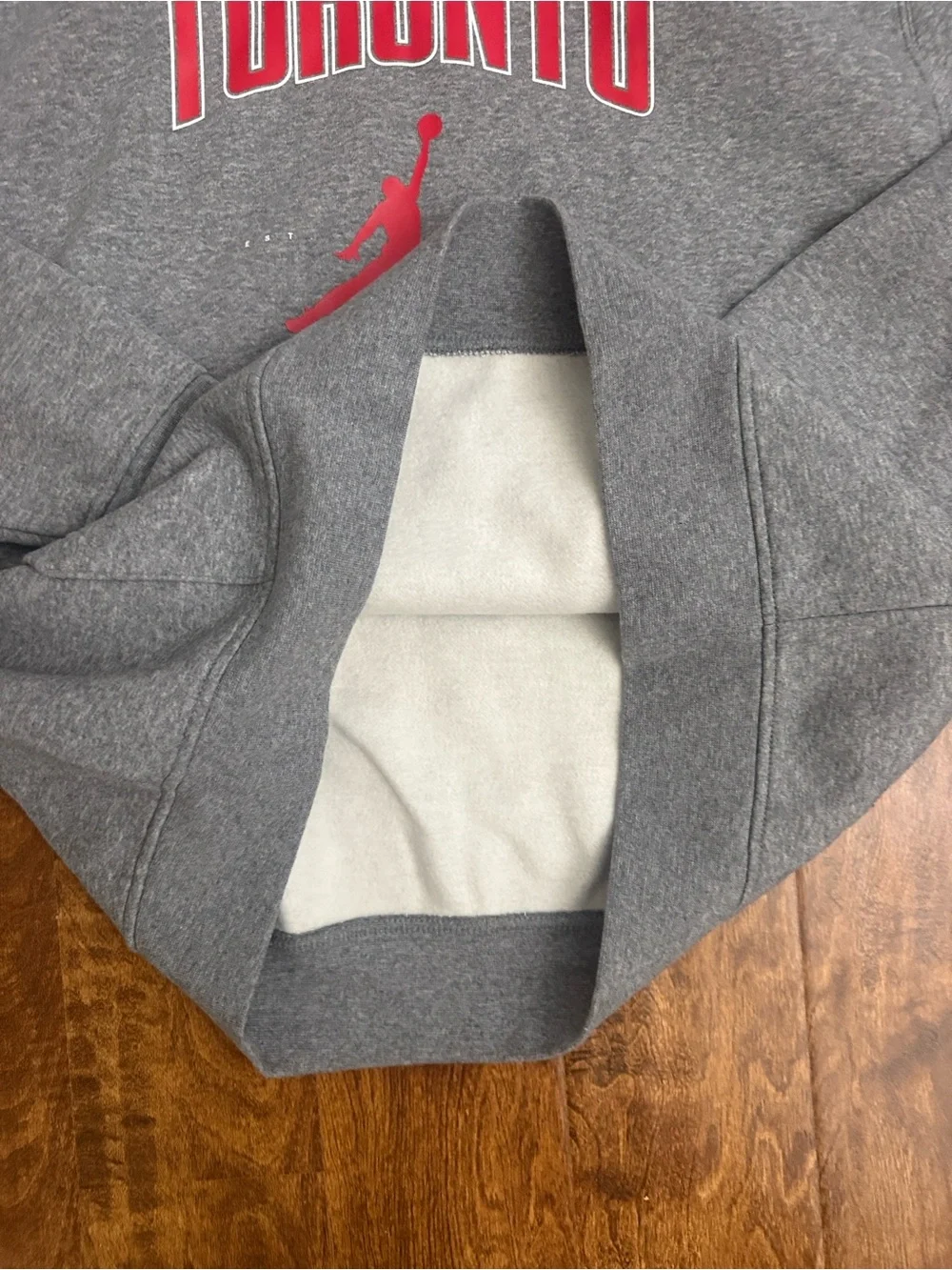 Jordan Toronto Grey Pullover Hoodie with Red Logo